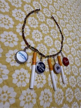 Beaded Necklace with Bottle Cap Charms and Cigarette Pendants